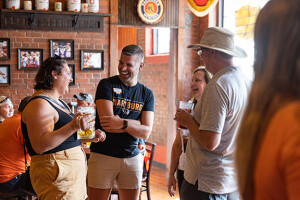 Members of the Wartburg community mingle at a networking event.