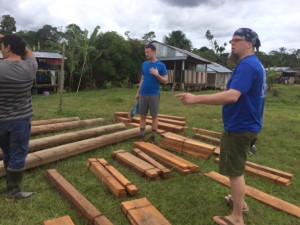 Tyler Vogel ’17 and Dr. Michael Bechtel ’94, assistant professor of science education, help construct the bat house in the Maijuna community in Peru.