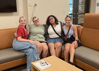 Castle Connections students hanging out in a lounge