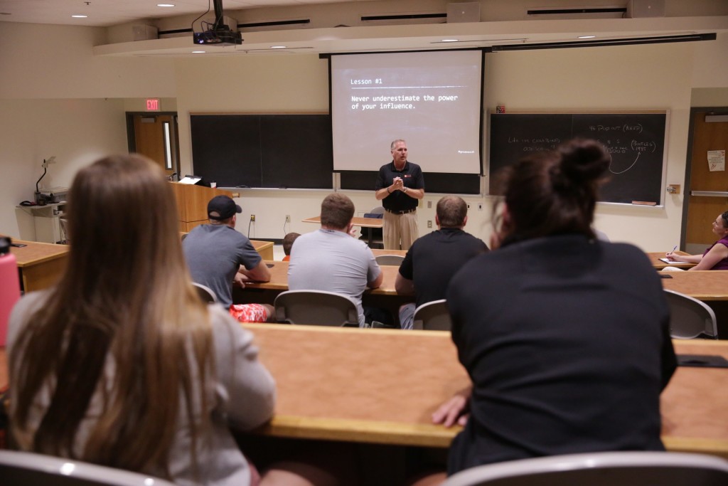 Chuck Long speaks with students at Wartburg College.