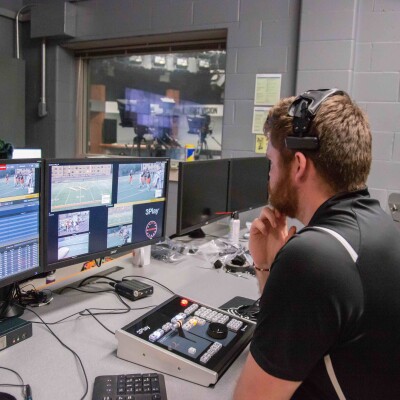 Josh Voigt ’20 works in the Knight Vision production booth during a home football game.