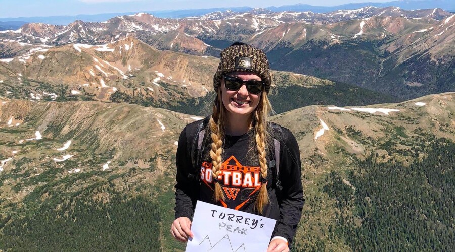 Madison Stoaks at the top of Torrey Peak in Colorado