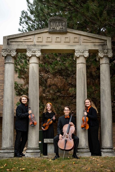 St. George String Quartet The members of the St. George String Quartet pose near the Wartburg pillars.