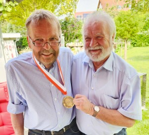 Günter Schuchardt (left) and Hans-Peter Brodhun in Germany. Schuchardt was presented the medal during a special ceremony at his home while Brodhun received his medal during the Wartburg Choir performance at the Wartburg Castle in May.