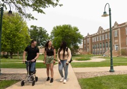 Wartburg students walk on campus.