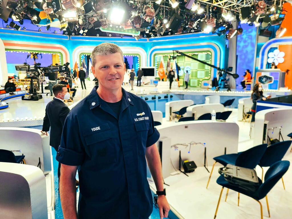 Steven Youde stands on the Price Is Right set.